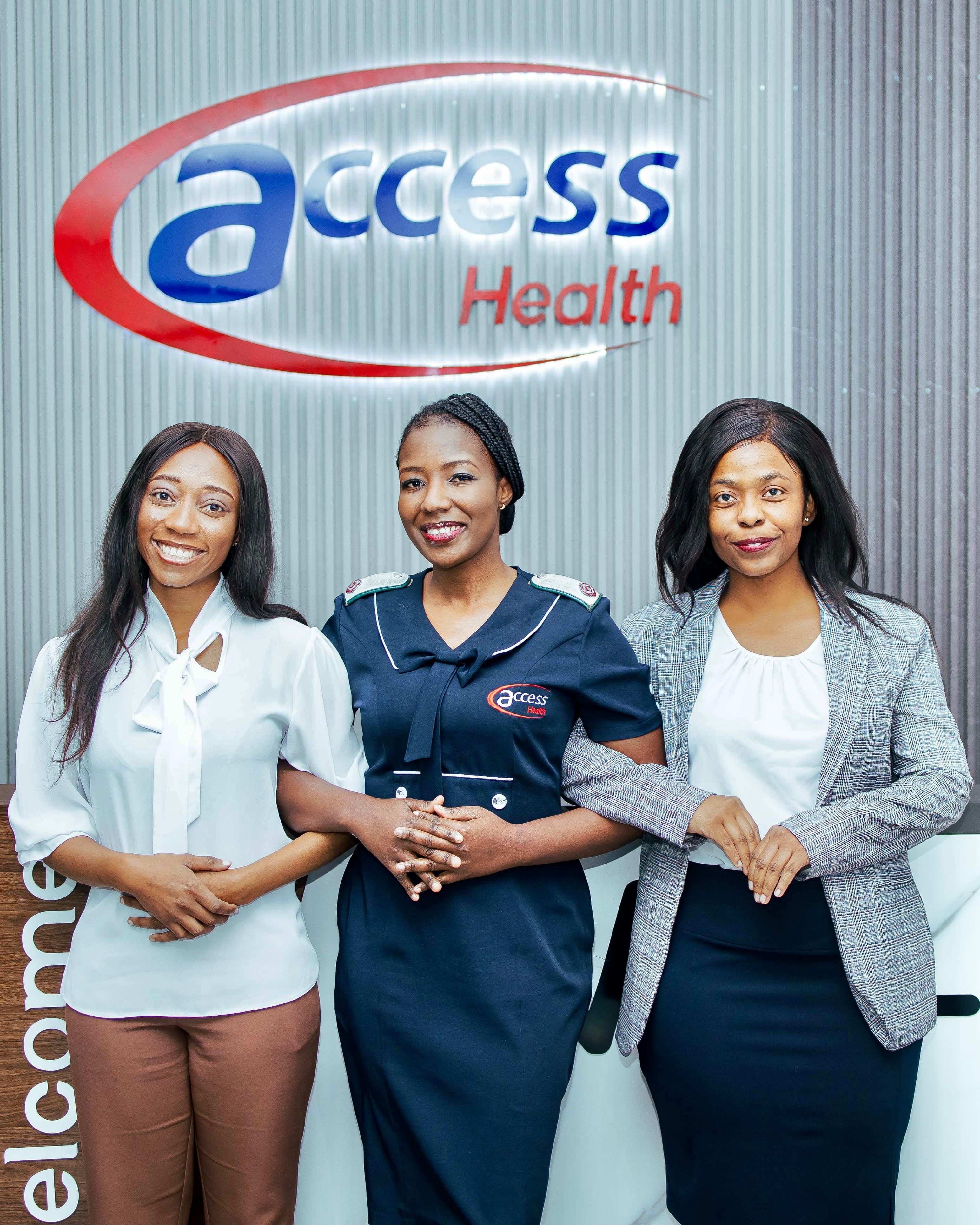 Clinic team gathered together smiling